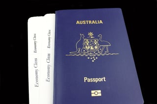 Australian passport and flight ticket