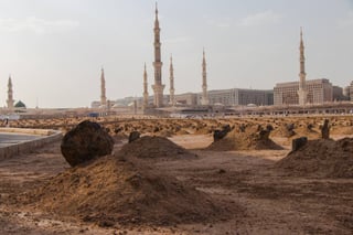 Muslim Devotees Resting Under The Giant Retractable Tent At Prophet Muhammad Mosque In Medina