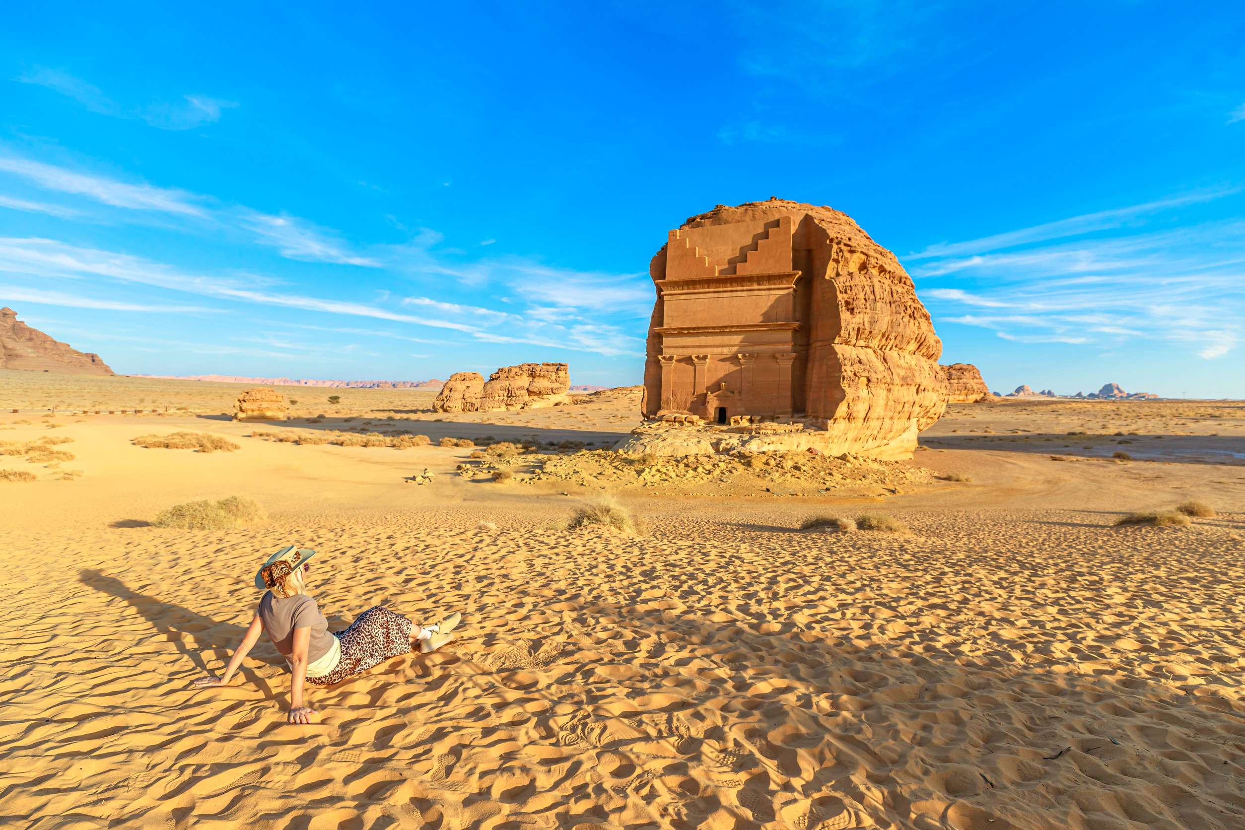 Woman Tourist Is Enjoying The View Of The Majestic Qasr Al Farid The Tomb Of Lihyan Son Of Kuza